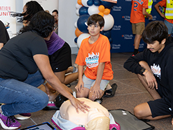 CPR training at the UTHealth Houston health fair