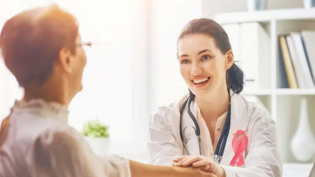 Female patient listening to doctor in medical office