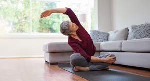 Mature woman in yoga pose